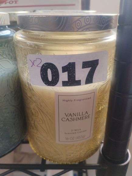 Vanilla Cashmere 2-Wick Scented Candle, 16 oz. A highly fragranced 16 oz two-wick candle with a Vanilla Cashmere scent in a decorative embossed glass jar. - $10 - 15