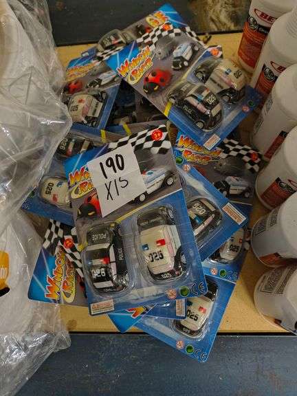 Window Racer Window Racer Police Car Toy Set. A package containing two small toy ...