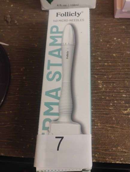 Folicly Derma Stamp. A microneedling tool with 140 micro-needles designed to stimulate hair follicles and enhance serum absorption. - $39.99