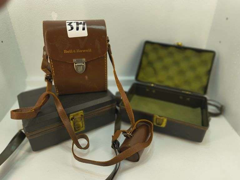 Vintage Bell & Howell Camera Cases. A collection of vintage hard and soft-sided carrying cases