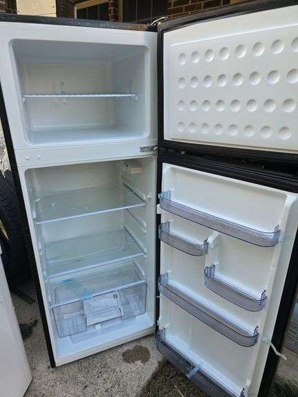 RCA Top Freezer Refrigerator. Works great. Never used