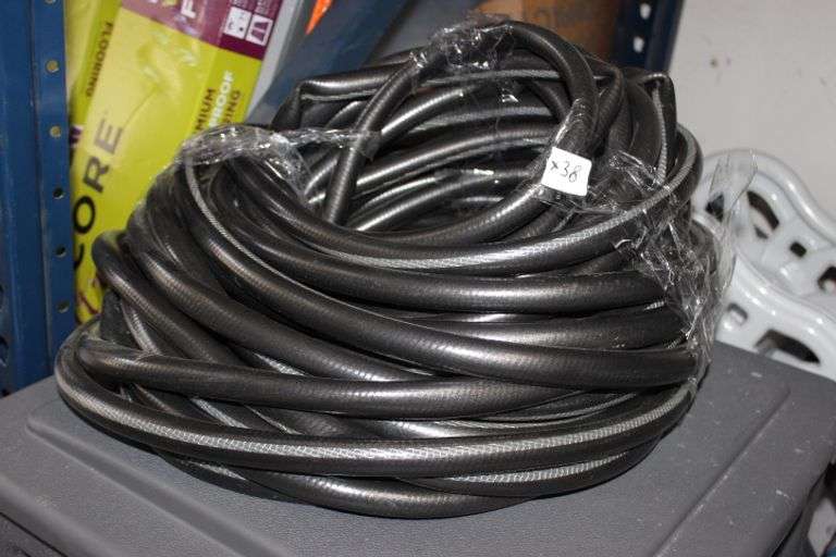 Neverkink Teknor Apex 5/8-In X 100-Ft Heavy -Duty Kink Free Vinyl Gray Coiled Hose Retail:$50