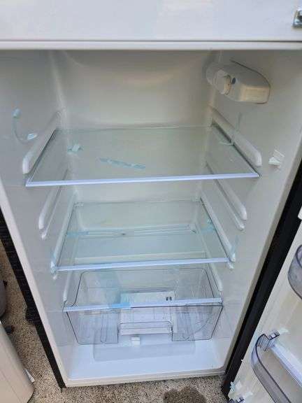 RCA Top Freezer Refrigerator. Works great. Never used