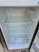 RCA Top Freezer Refrigerator. Works great. Never used