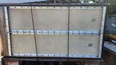 TEXAS INSTRUMENTS PORTABLE ARMORED 1/2inch THICK SOLID SHEET STEEL PANEL SAFE ROOM OR TORNADO SHELTER 8ft x 10ft  ON CUSTOM PLATFORM DOLLY. EACH ARMORED PANEL IS MADE OF TWO 1/4" SHEETS OF STEEL , EACH ARMORED PANEL IS 1/2" THICK, INCLUDES HATCH AND ONE DOOR.