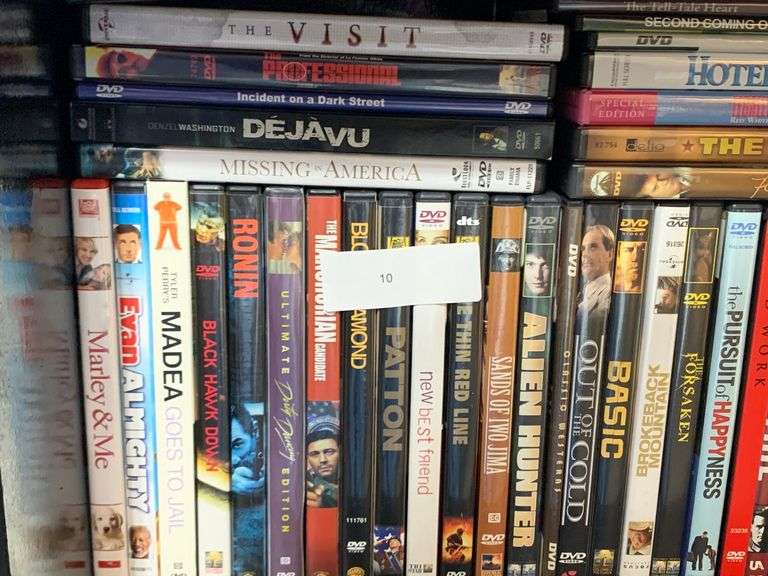 Lot of Dvd's this shelf only