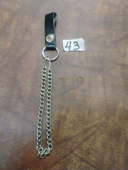 Leather Strap Wallet Chain Keychain. This accessory combines a durable leather strap with two metal chains to securely attach a wallet or keys to a belt loop. - $15.00