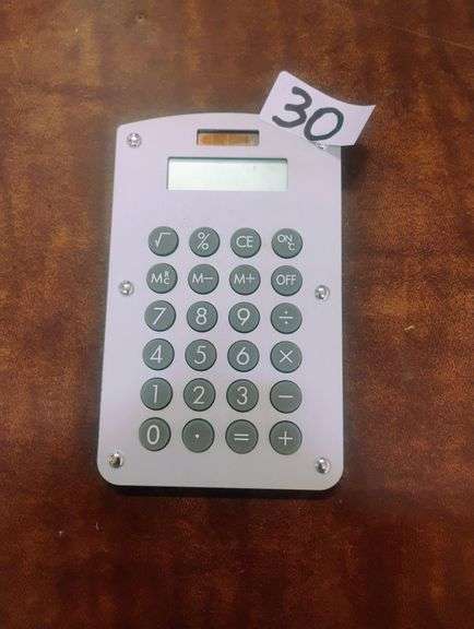 Unbranded Basic Solar Powered Calculator. This is a compact calculator featuring solar power, a small LCD display, and standard arithmetic functions for everyday calculations. - $5.00