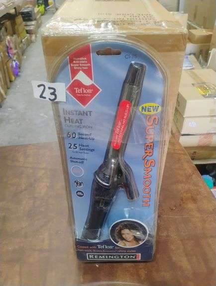 Remington Instant Heat Curling Iron CI-75. This curling iron features a 3/4-inch Teflon-coated barrel for non-stick, anti-static, and smooth shiny hair, with 60-second heat-up and 25 heat settings. - $20.00