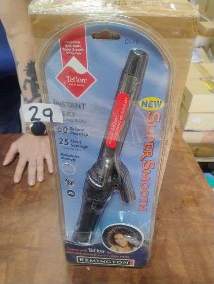 Remington Instant Heat Super Smooth Curling Iron CI-75. This is a Remington curling iron featuring an exclusive Teflon-coated barrel for non-stick, super smooth, and shiny hair, with 60-second heat-up and automatic shut-off. - $29.00