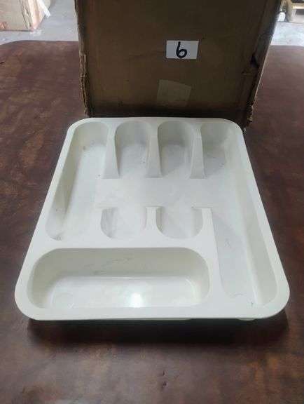 Generic White Plastic 6-Compartment Cutlery Tray. This tray is designed to organize and store various kitchen utensils neatly within a drawer. - $10.00