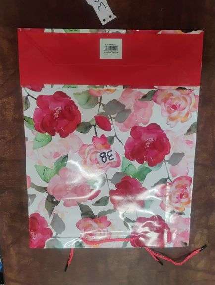 KW-08004XL Extra Large Floral Rose Print Gift Bag. This is an extra large paper gift bag featuring a watercolor-style rose floral pattern and red braided handles, suitable for presenting larger gifts. - $6.00