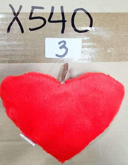 Red Fluffy Heart Apple Plush Toy. This is a soft, red, heart-shaped plush toy featuring a shiny gold stem, designed for decorative purposes or as a small novelty gift. - $8.00