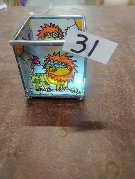 Kids' Lion Design LED Decorative Light Box. This is a light-up decorative box adorned with colorful cartoon lion illustrations, providing ambient illumination for a child's room. - $20.00