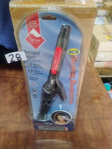 Remington Instant Heat CI-75 Super Smooth Teflon Curling Iron. This Remington curling iron features a 3/4-inch Teflon-coated barrel designed to provide non-stick, anti-static, super smooth, and shiny curls with 60-second heat-up and 25 heat settings. - $28.00
