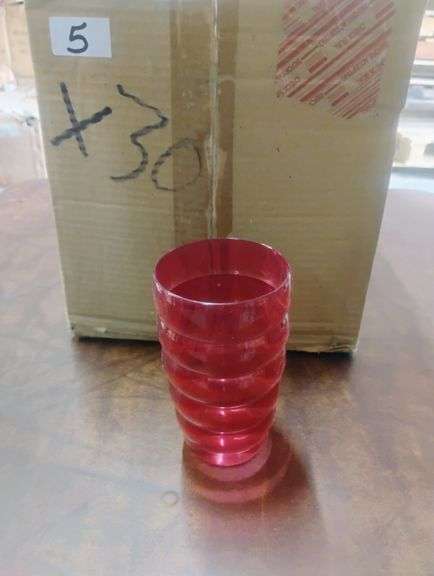 Generic Red Ribbed Plastic Tumbler. This is a reusable plastic cup featuring a ribbed design, suitable for serving beverages. - $1.50