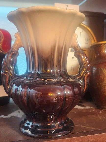 S&G KERAMIC MID-CENTURY TROPHY URN STYLE VASE. IT FEATURES A BROWN AND CREAM DRIP GLAZE FINISH AND DOUBLE HANDLES. 
VALUE $45