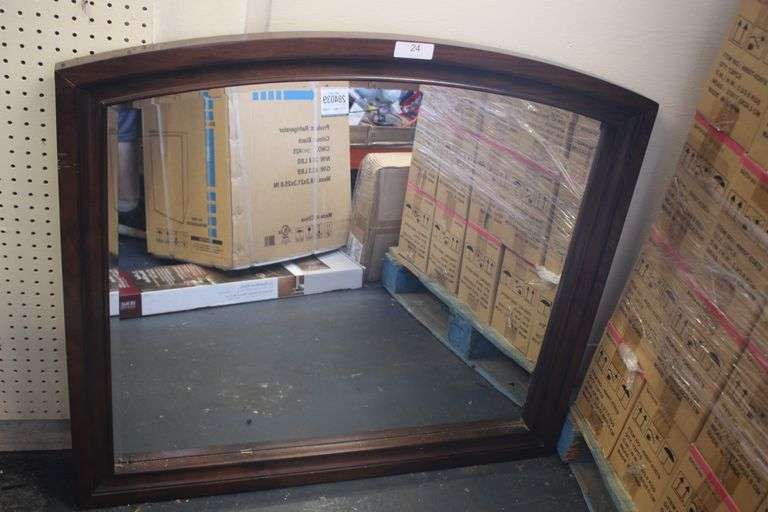 BEVELED MIRROR SET IN A SOLID WOOD FRAME
