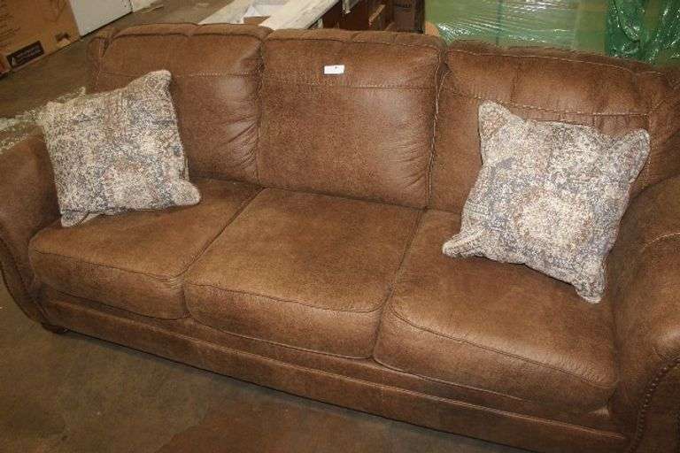 Ashley Chasemore Stationary Sofa in Earth.  $529.99