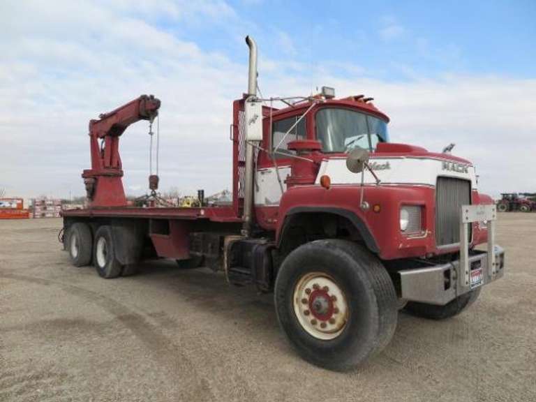 1986 Mack DM688S • Flatbed & Crane Truck