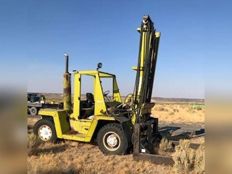 LOCATED OFF-SITE - Clark/Sunny D - Diesel Powered Hay Squeeze