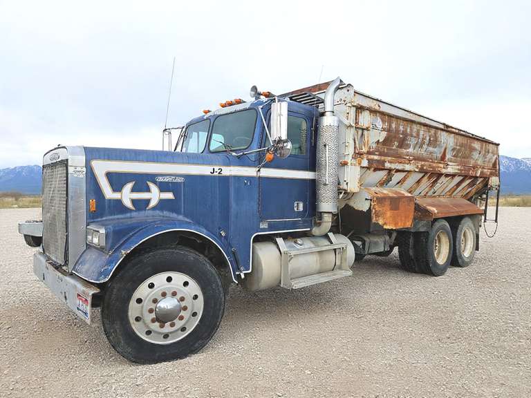 1985 Freightliner w/ Self Unloading Bed