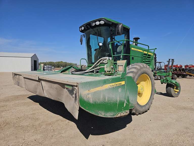 John Deere R450 windrower with 995 16-foot rotary head Lot 550