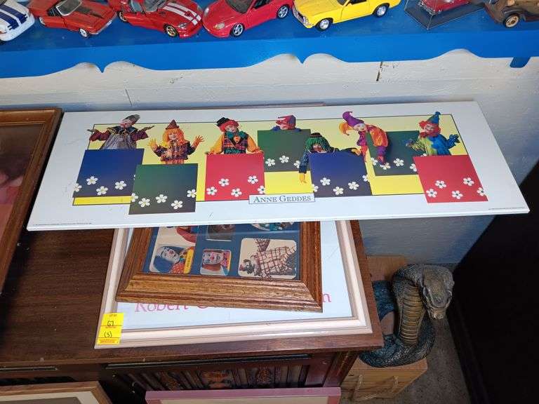 (1) 1996 and Geddes Childeren Clown Wall Hanging 36 x 12, (1) Multiple Clown Photos in Frame 17 x 14, and (1) Robert Owen Collection Clown Print in Frame 18 x 22