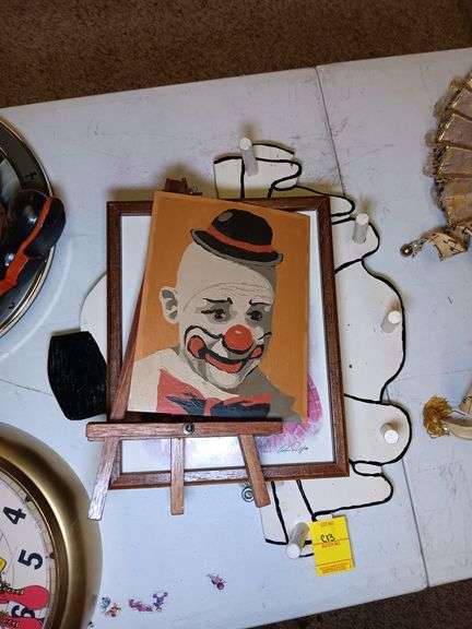 (1) Clown Painting on Eseal Mini, (1) Clown Music Box Wall Hanging, and (1) Wooden Clown Coat Rack