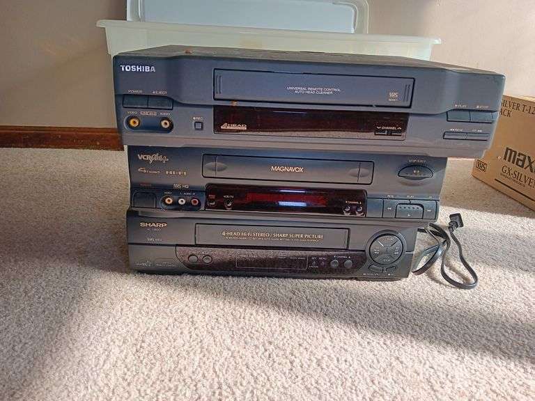 Toshiba VHS Player, Sharp VHS Player, and Magnavox VHS Player