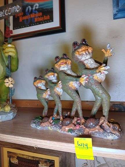 Four Frogs Walking Statue