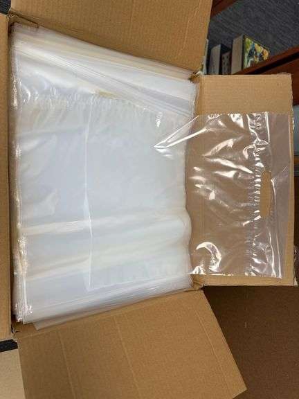 Uline Clear Die Cut Handle Bags and Unline Tubes - Auction Solutions ...