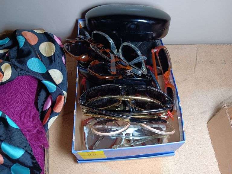 Assorted Styles of Sunglasses and Cases