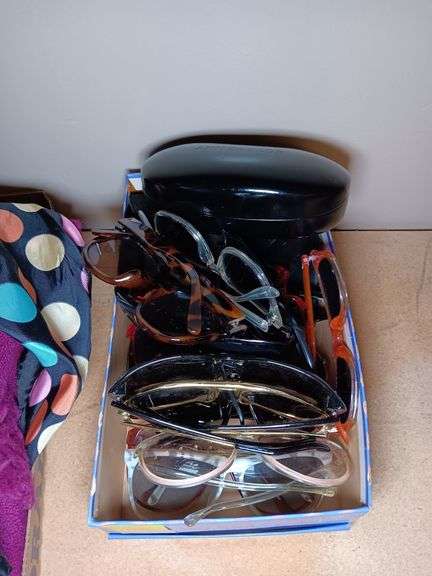 Assorted Styles of Sunglasses and Cases