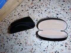 Assorted Styles of Sunglasses and Cases