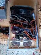 Assorted Styles of Sunglasses and Cases