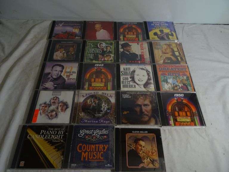 Assorted CDs such as great ladies of country music piano by candlelight Kate Smith and much more