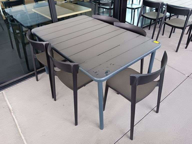 Metal Patio Table with (5) Plastic Chairs 55 x 35