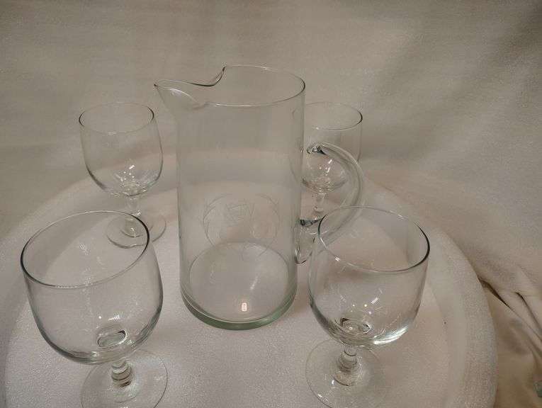 Crystal etched pour picture and four stemmed wine glassesne glasses