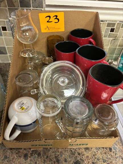 Lot of coffee mugs and glasses.