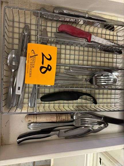 Drawer of silverware. Drawer not included.