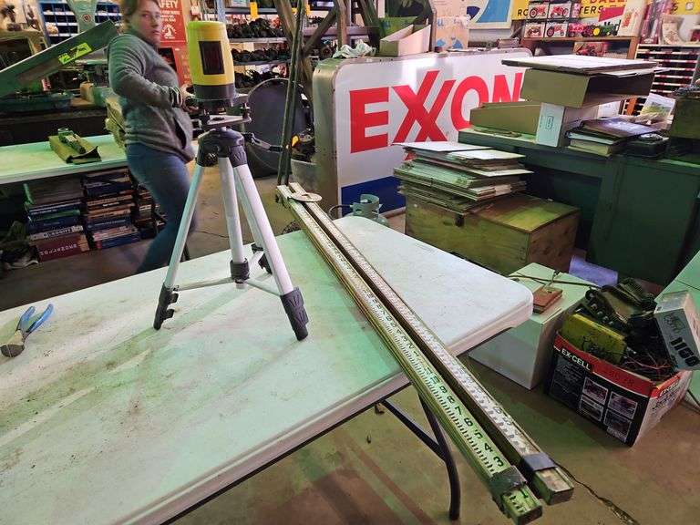 Laser Level & (2) Grade Poles