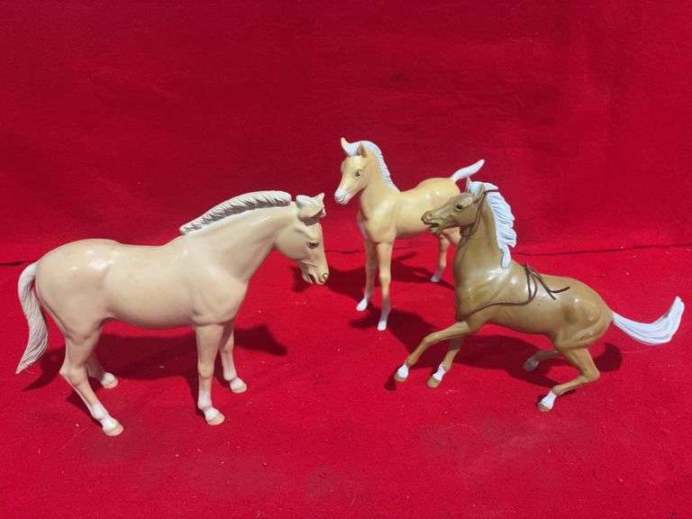 Three (3) Toy Horses