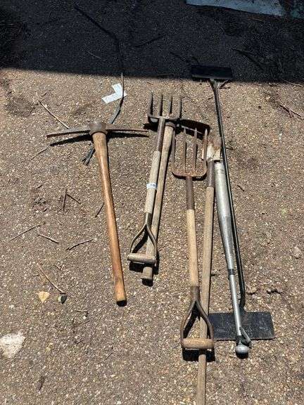 2 pickaxes 2 pitchforks 1 baseball bat misc