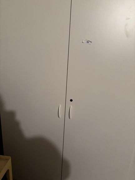 Filing cabinet, coffee mugs, coffee maker, misc decor