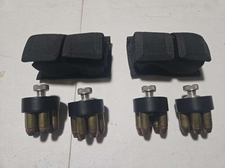 (4) Revolver Speed Loaders and (2) Speed Loader Pouches