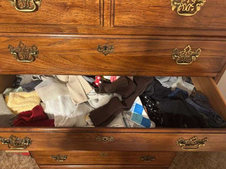 Dresser with clothes