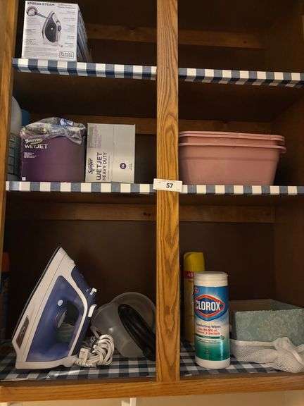 Clothing iron, bins, clean wipes misc