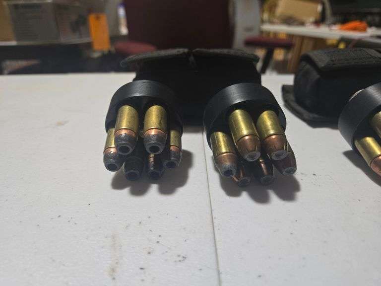 (4) Revolver Speed Loaders and (2) Speed Loader Pouches