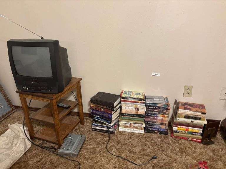 Old tv with cords misc books